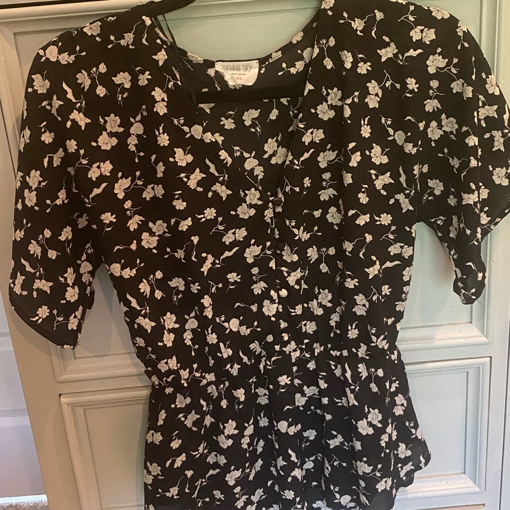 Black floral peplum top